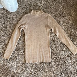 Nude turtleneck sweater